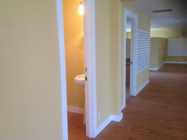 View along wall opposite Galveston windows along powder room and reception entry View along wall opposite Galveston windows along powder room and reception entry
